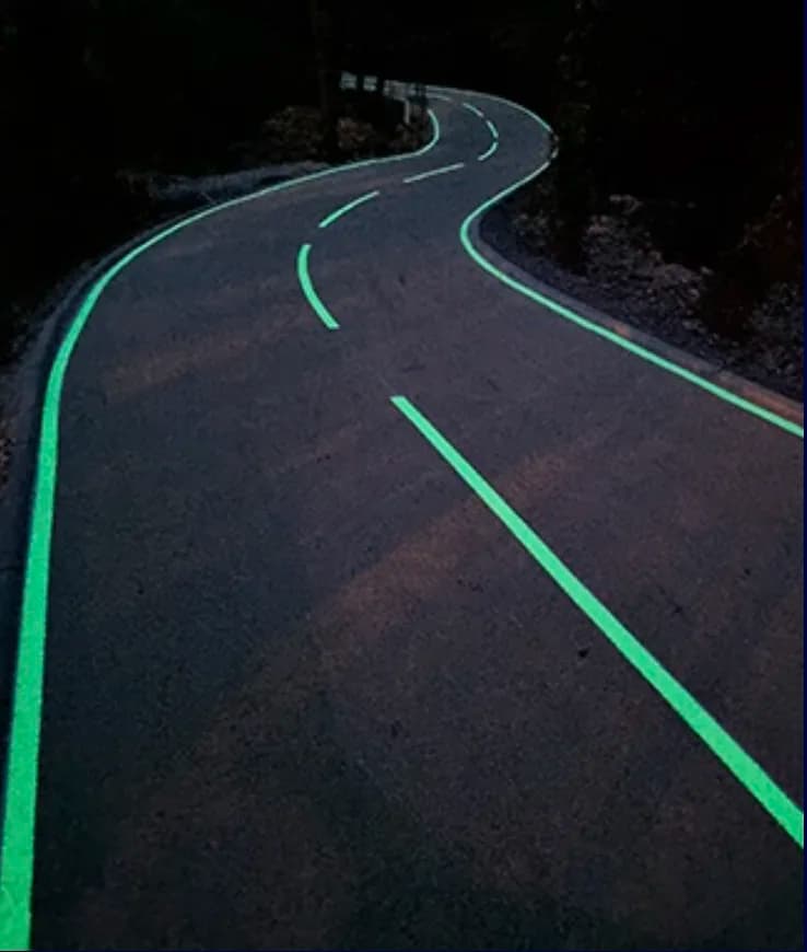 LuminoKrom photoluminescent road markings glowing at night